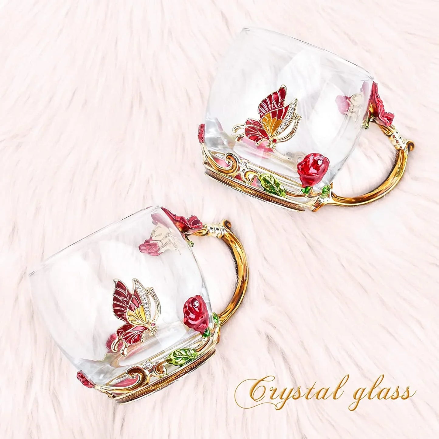 Pair of crystal glass coffee mugs with gold handles, red rose and butterfly decorations
