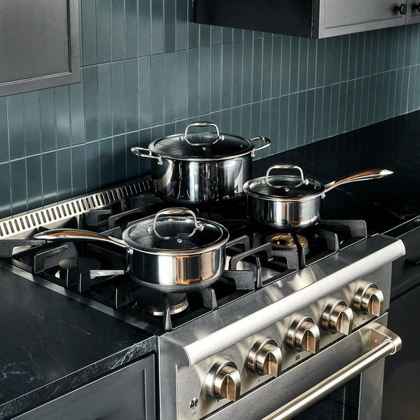 Hexclad Hybrid Nonstick 14-Piece Cookware Set, 8", 10", and 12" Pans with Lids, 2, 3, and 8Qt Pots with Lids, and 2 Silicone Trivets, Stay-Cool Handles, Dishwasher and Oven-Safe, Induction Ready3