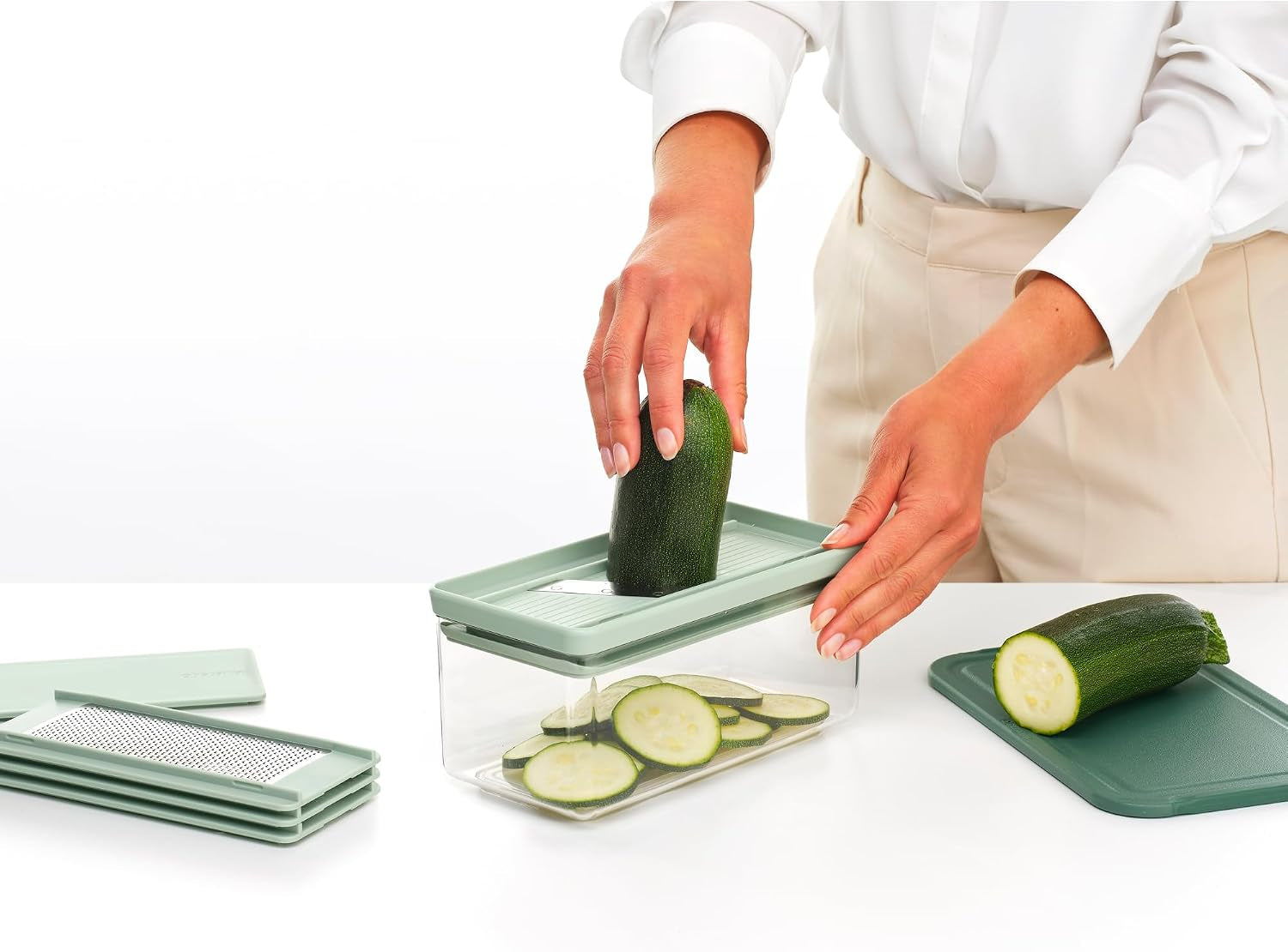 brabantia-tasty-slicer-and-grater-set-vegetable-slicer-with-two-graters-storage-box-non-slip-base-dishwasher-safe-design-100-recyclable-tritan-plastic-jade-green