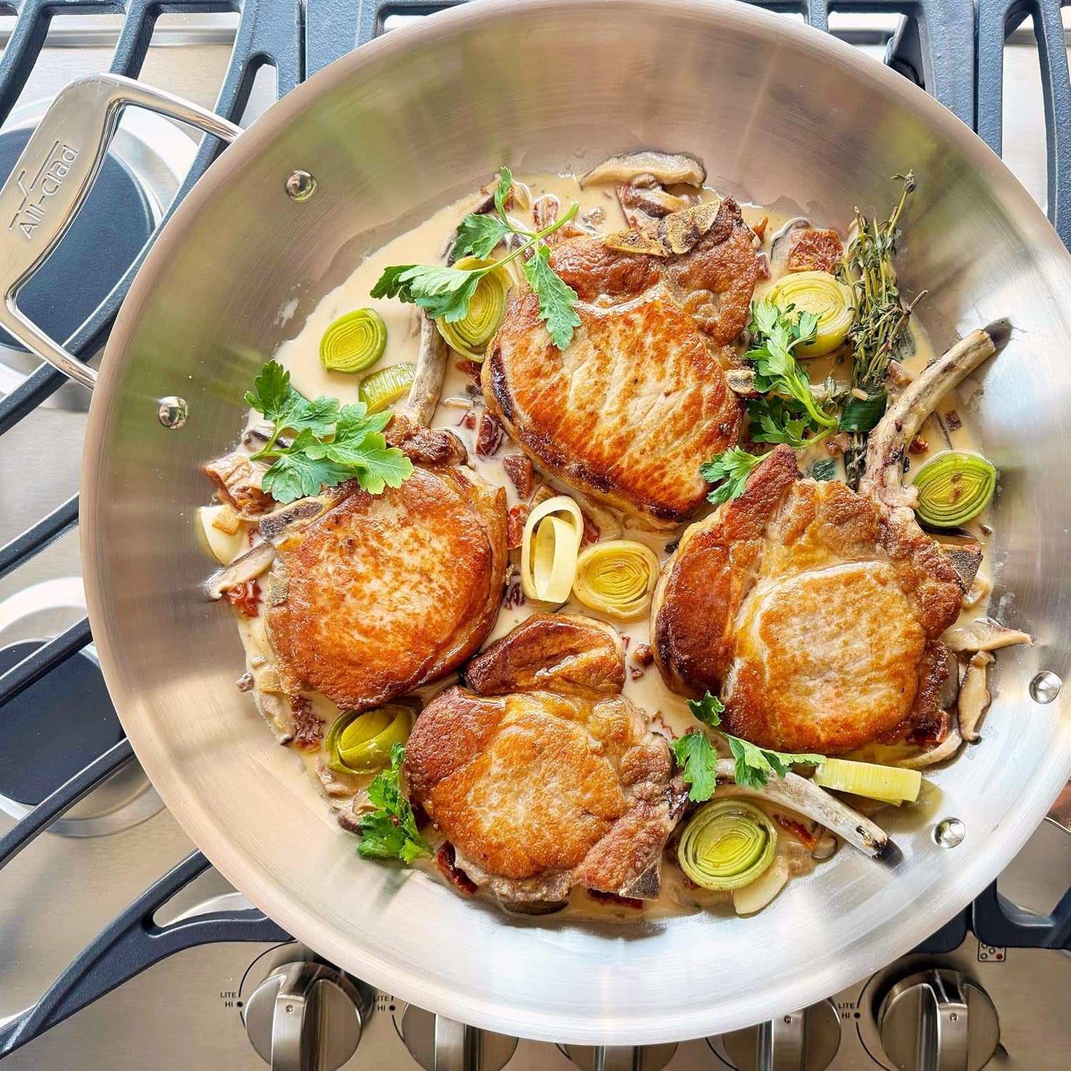 all-clad-d5®-stainless-steel-core-14-inch-frying-pan-covered-made-in-the-usa-the-upgrade-for-supremely-even-heat-oven-safe-induction-compatible-cookware