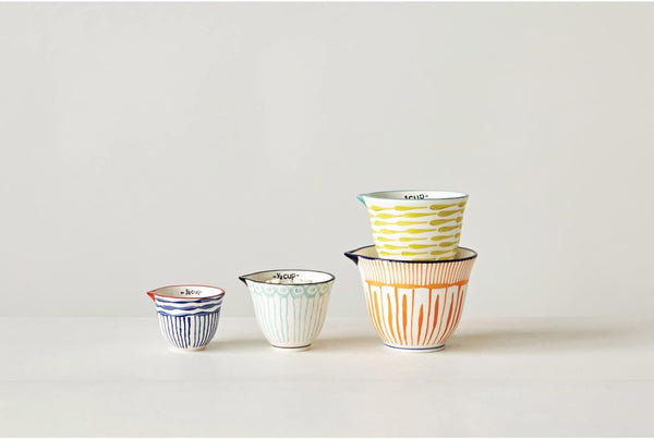 Creative Co-Op 4‑Piece Hand‑Painted Stoneware Measuring Cups with Patterns and Colored Rims, Multicolor2