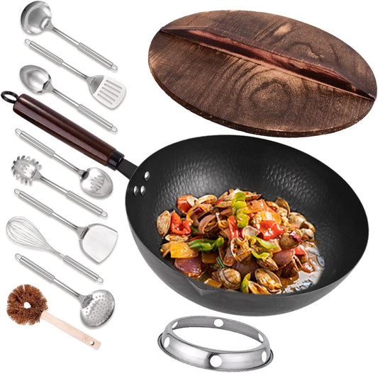 Black wok with cooked food, wooden cutting board, and various kitchen utensils on a white background