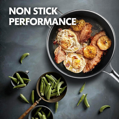 13-inch non-stick stainless steel wok with fried eggs, ham, and apple slices, surrounded by fresh okra