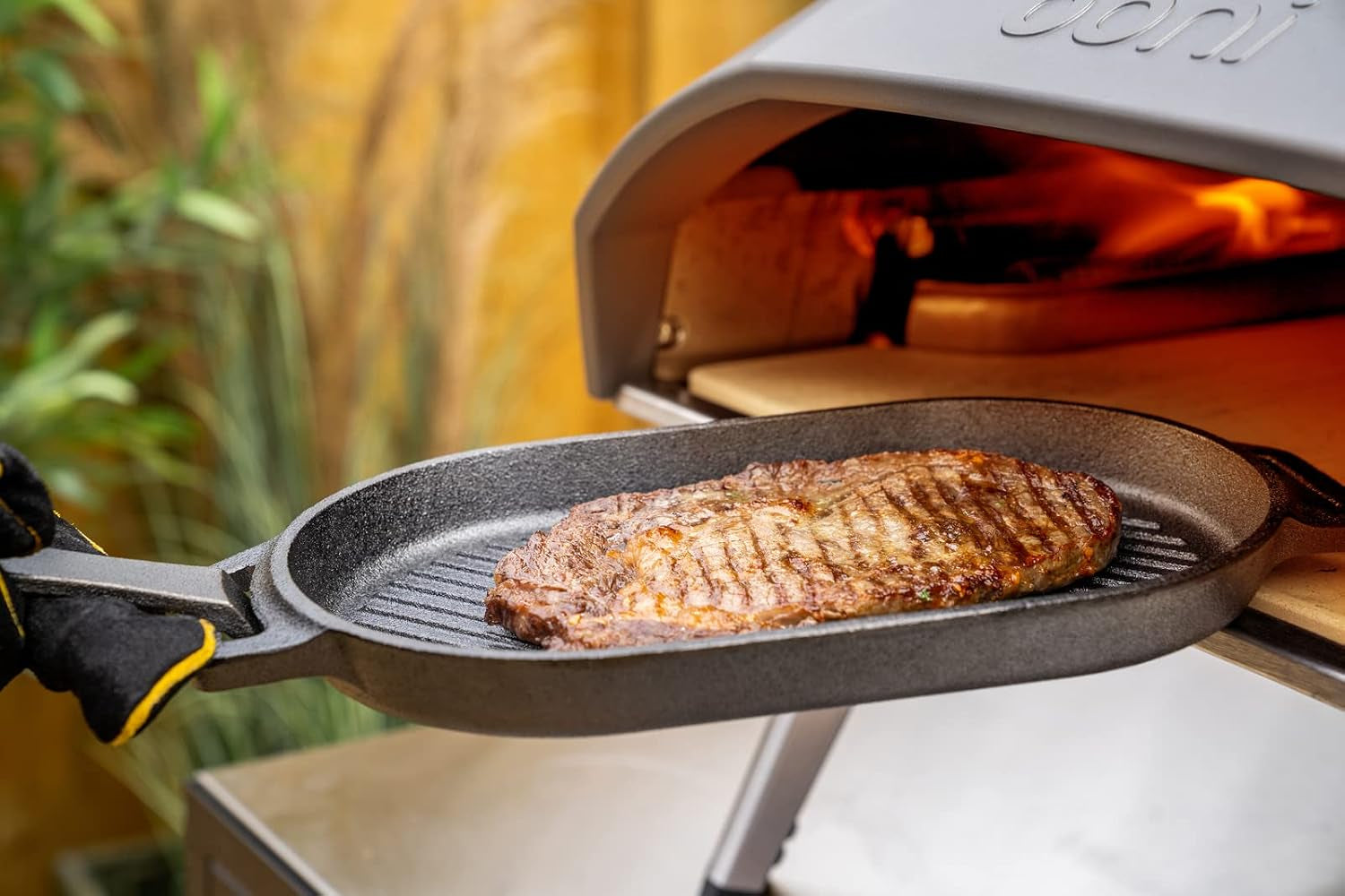 ooni-cast-iron-grizzler-pan-grill-frying-pan-12-x-6-griddle-plate-with-removable-handle-and-stainless-steel-trivet-pre-seasoned-non-stick-oven-safe-cookware-pizza-oven-and-bbq-accessories