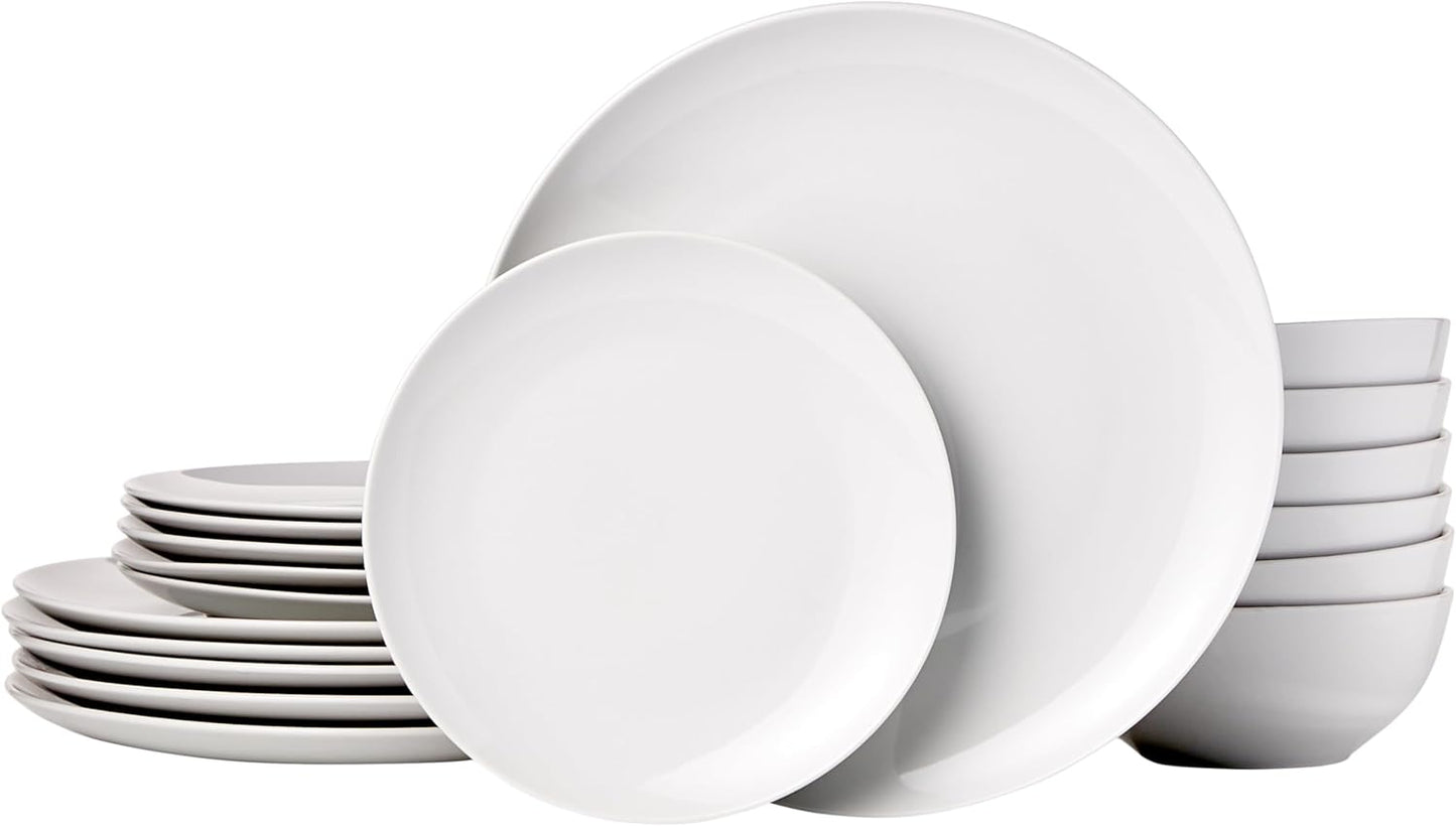 18-piece white porcelain dinnerware set with plates and bowls arranged for service for six.
