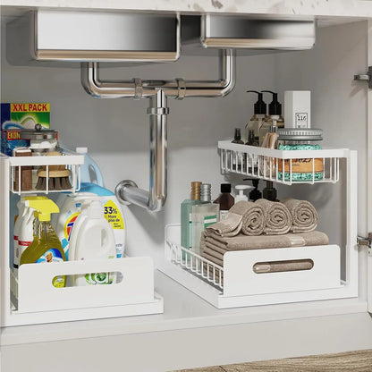 Under sink organizer with two-tier pull-out shelves holding cleaning supplies, toiletries, and folded towels
