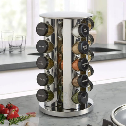 20-jar revolving stainless steel spice rack on kitchen countertop with labeled spices