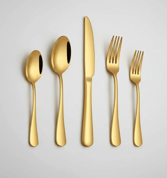 20-piece gold stainless steel flatware set with spoons, knives, and forks on white background