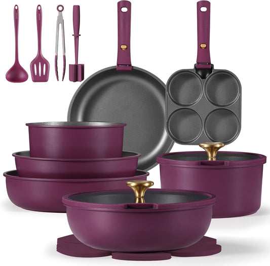 Purple cookware set with utensils on a white background