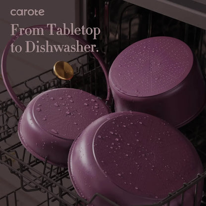 Purple nonstick pots and pans with water droplets inside a dishwasher rack, showcasing dishwasher-safe cookware