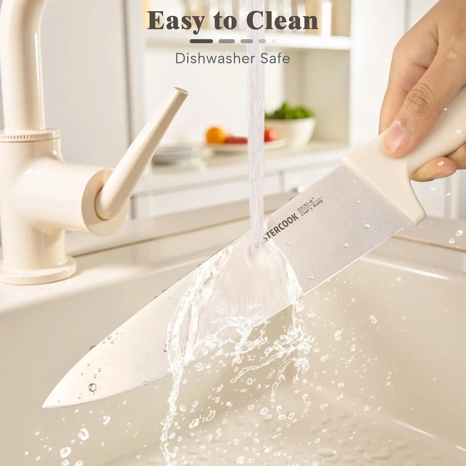 Hand washing white 8-inch chef's knife under kitchen faucet with water splashing in light kitchen sink