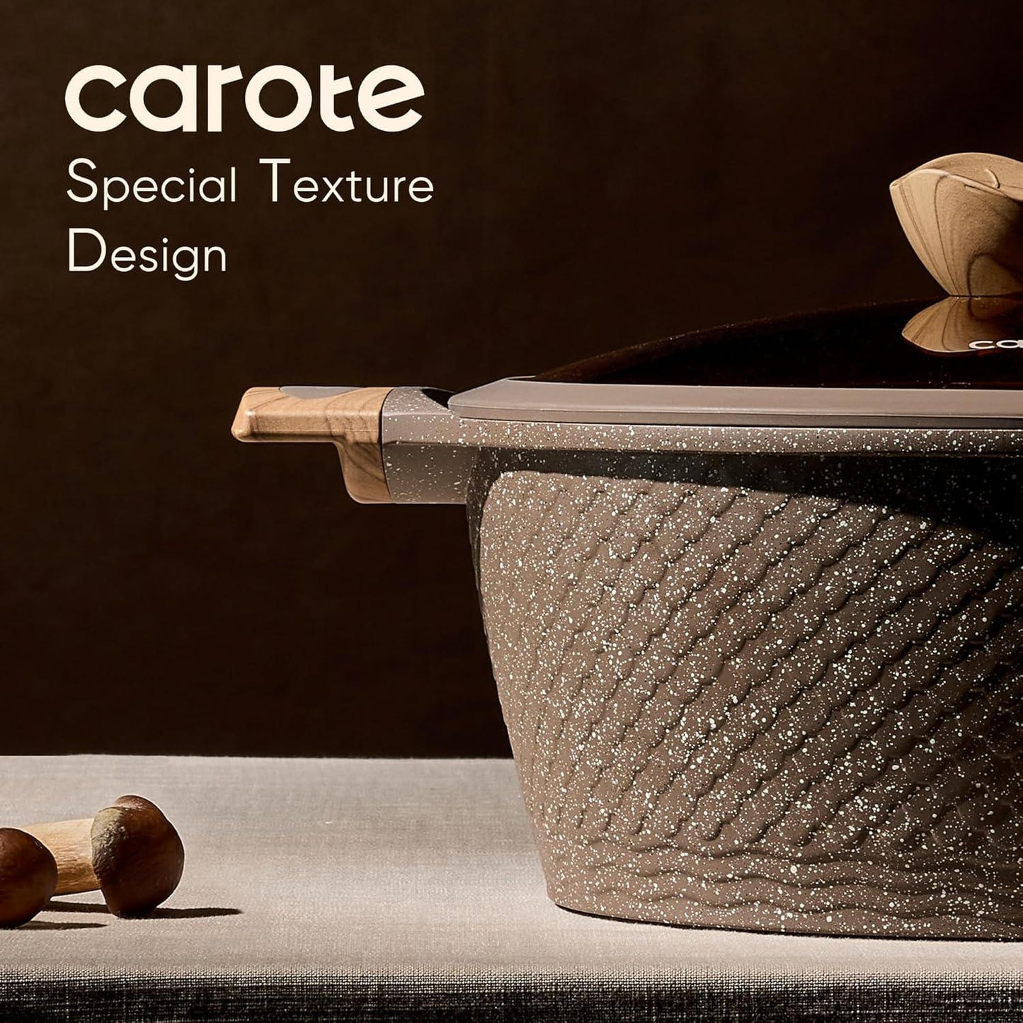 Close-up of Carote granite nonstick pot with special textured design and wooden handle on beige table