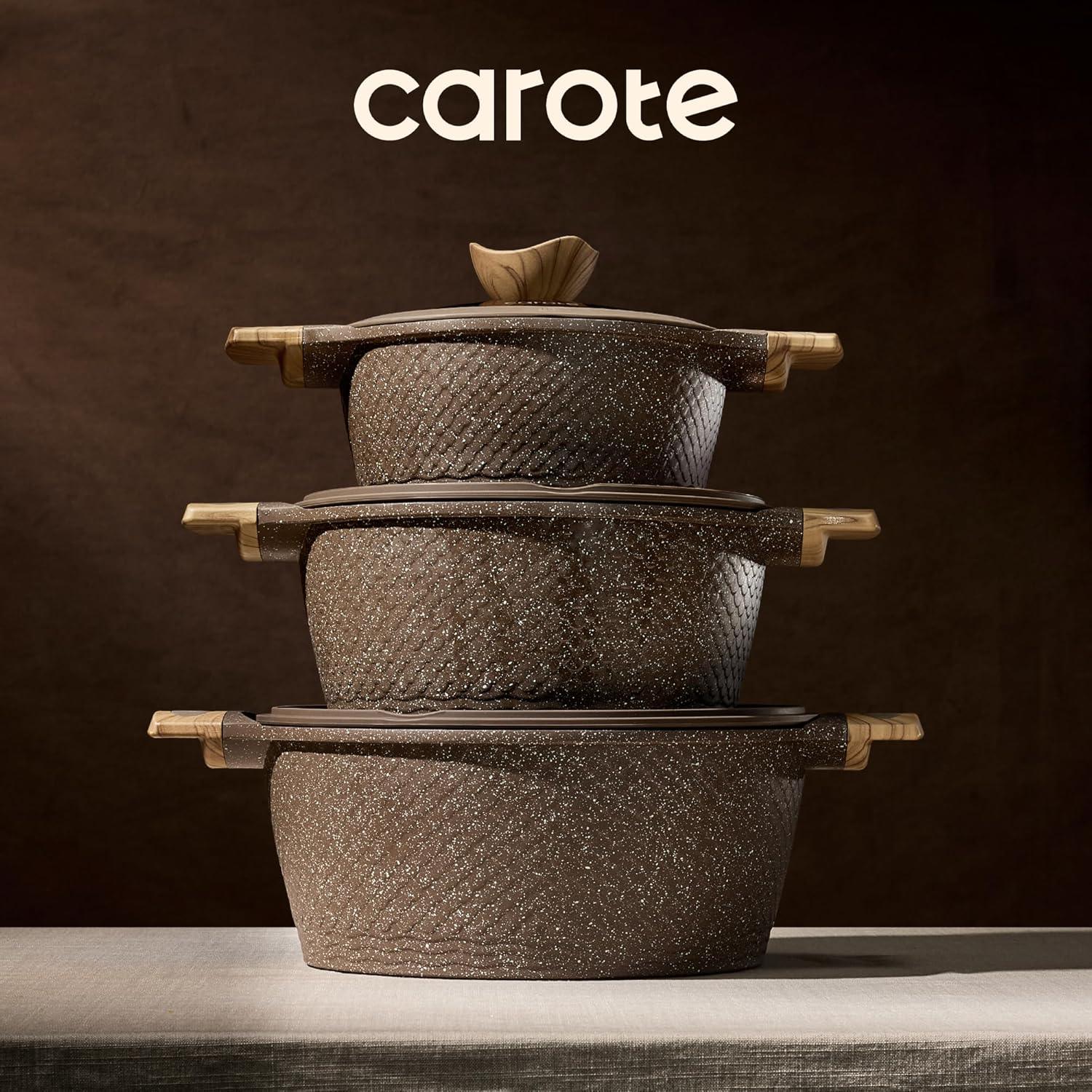 Stack of three textured brown granite nonstick pots with wooden handles and lids, on a beige cloth surface