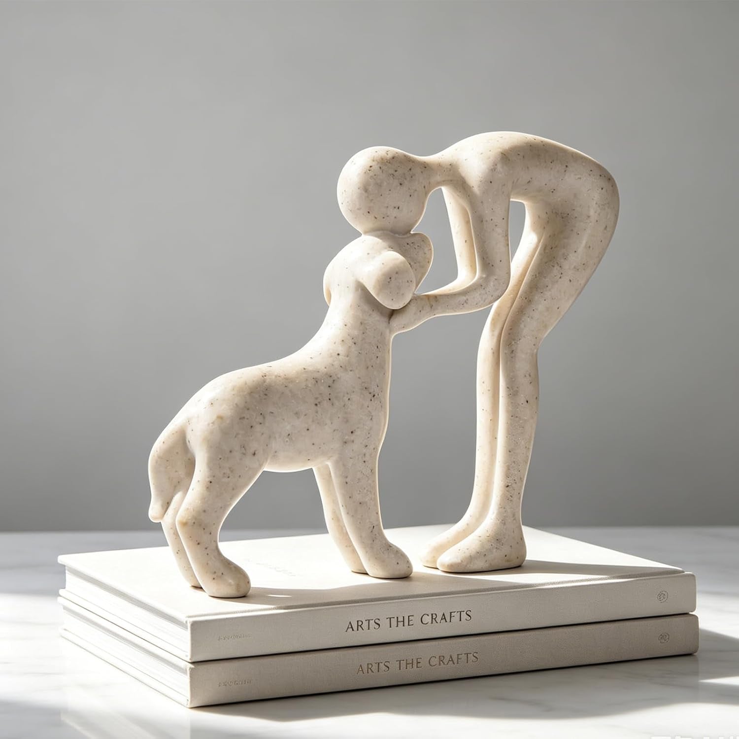 abstract-person-and-dog-head-to-head-figurine-sandstone-abstract-sculpture-celebrating-the-bond-between-person-and-pet-intimate-head-to-head-touching-memory-keepsake-for-dog-lovers