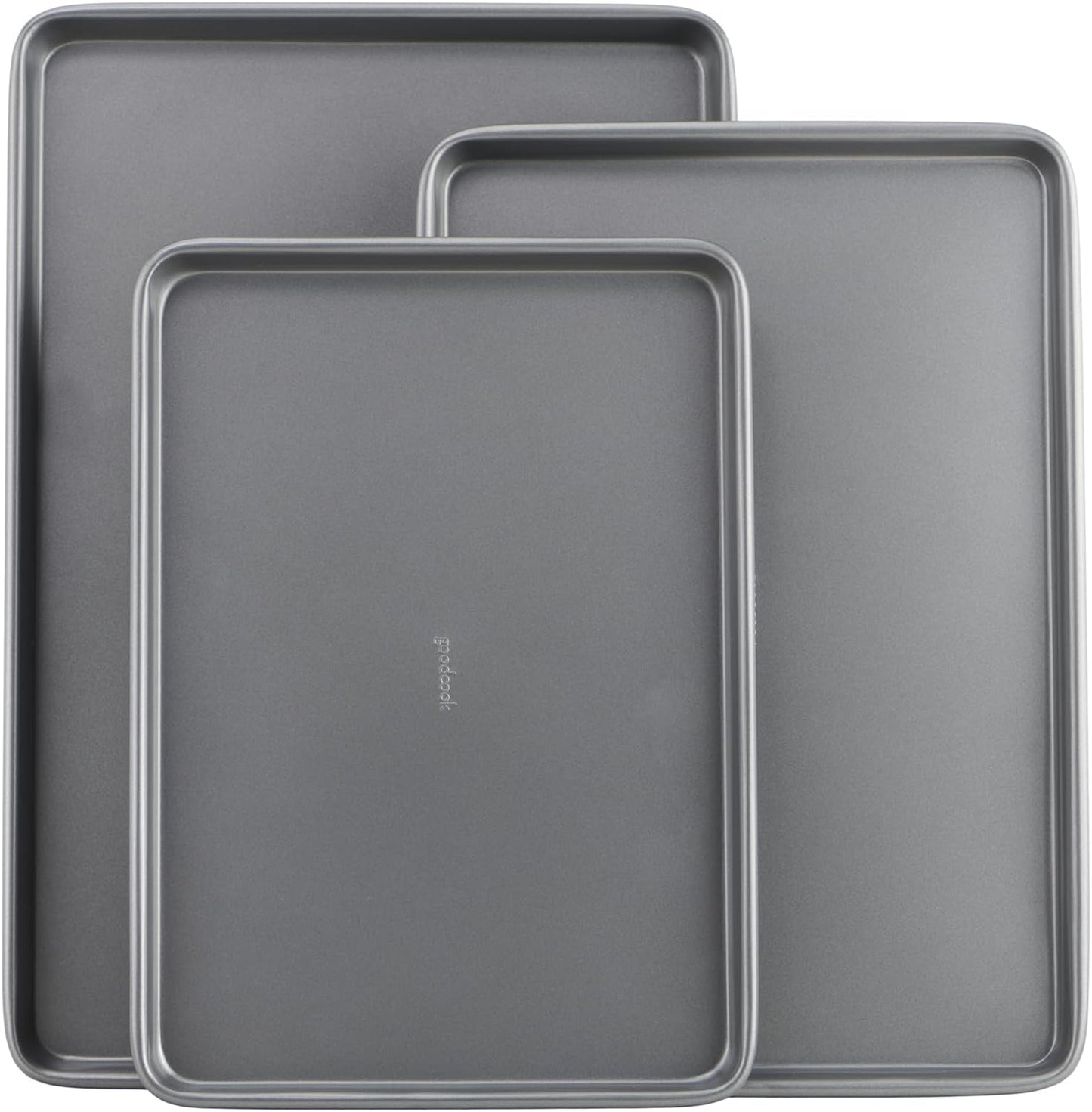 Three nonstick carbon steel baking sheets in small, medium and large sizes stacked together.