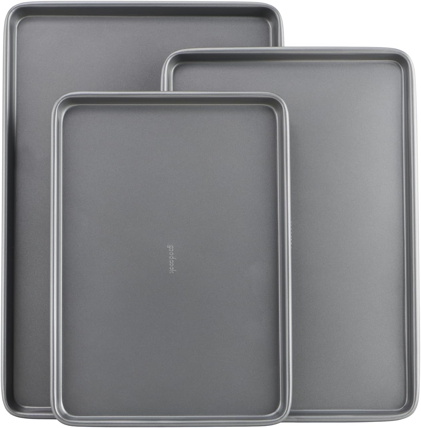 Three nonstick carbon steel baking sheets in small, medium and large sizes stacked together.