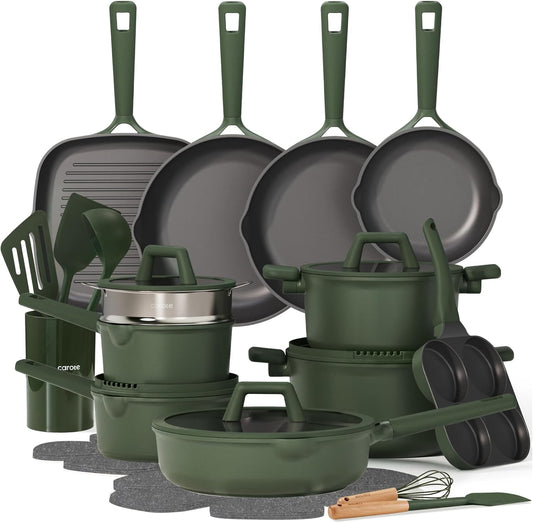 Set of green cookware including pots, pans, and utensils on a white background