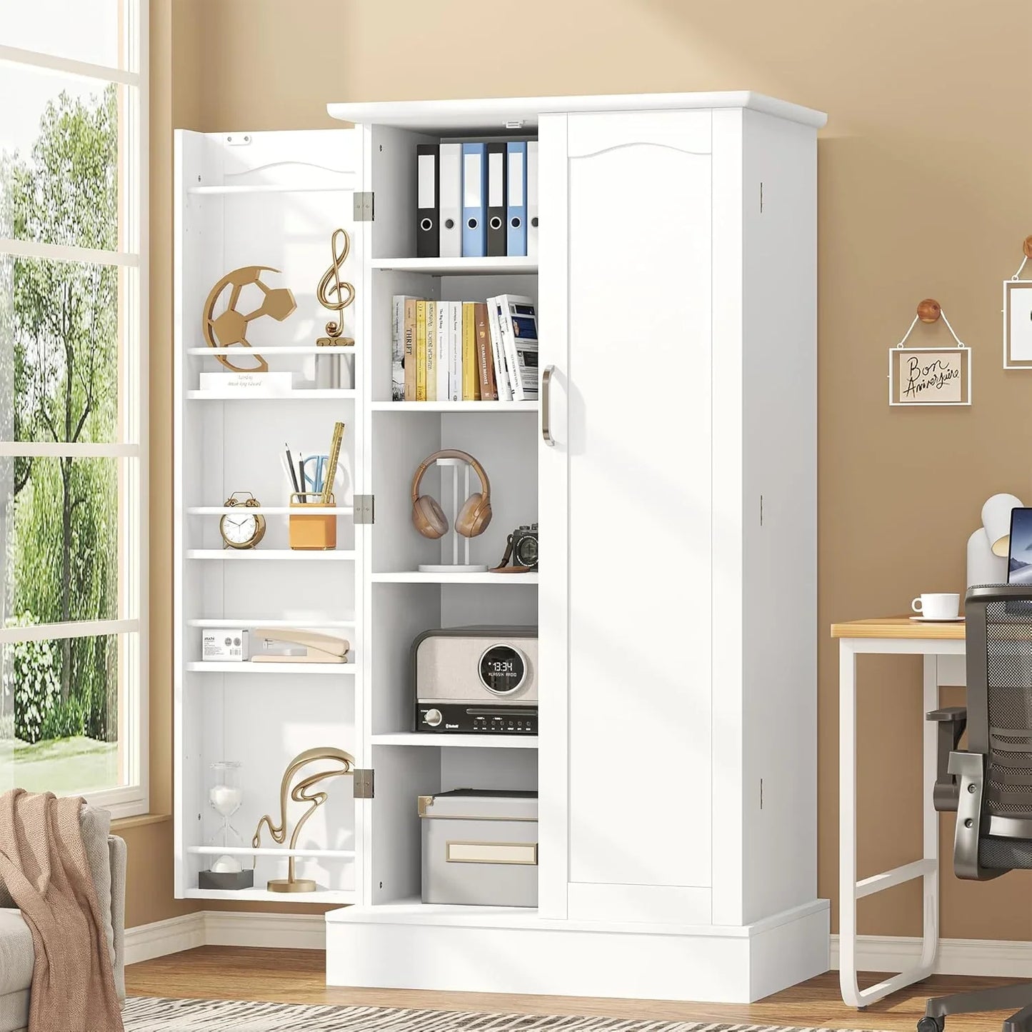 White freestanding pantry cabinet with adjustable shelves holding books, headphones, radio, and office supplies