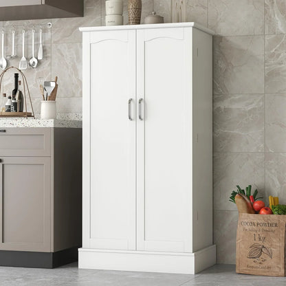 White freestanding pantry cabinet with two doors and silver handles in modern kitchen setting