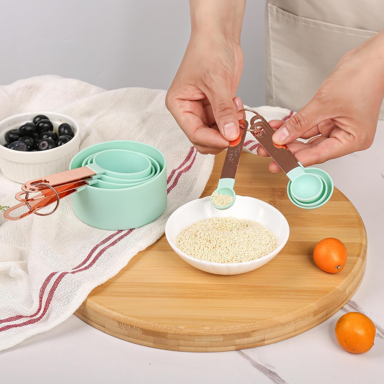 8-piece-stackable-rose-gold-stainless-steel-handled-measuring-cups