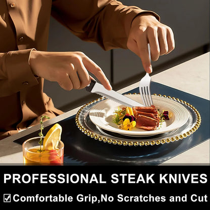 Person using professional stainless steel steak knife and fork to cut steak on decorative plate