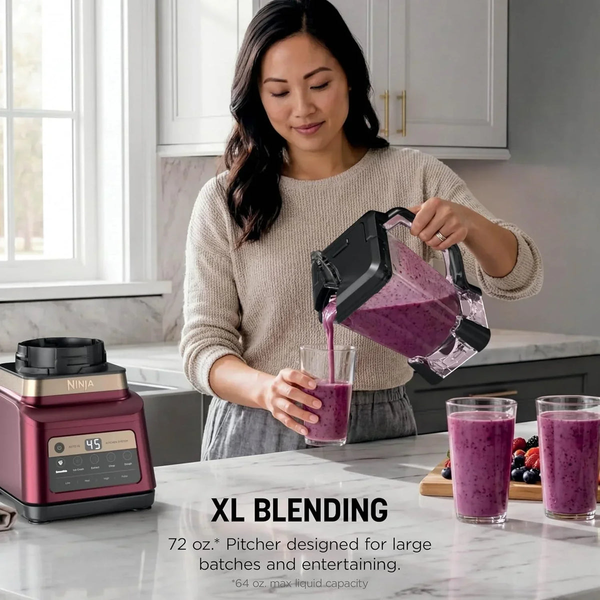 woman-pouring-a-purple-smoothie-from-a-ninja-blender-pitcher-into-a-glass