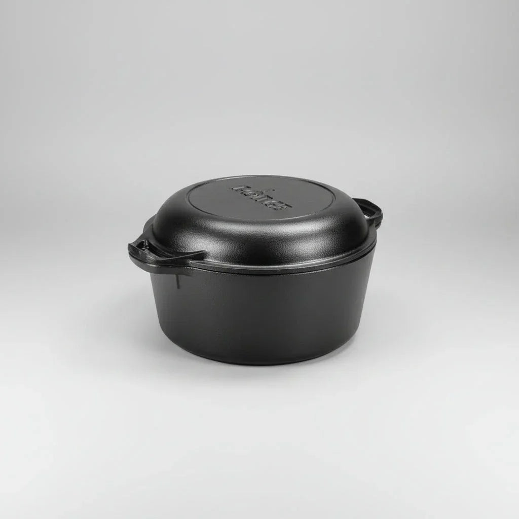 5-quart black pre-seasoned cast iron Dutch oven with double lids and side handles on plain background