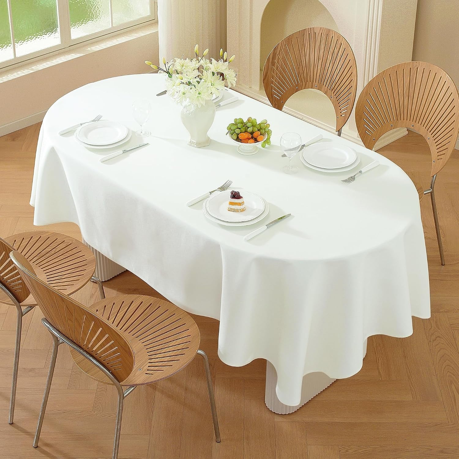 classic-white-oval-tablecloth-for-party-restaurant-and-home-60-x-84-inch