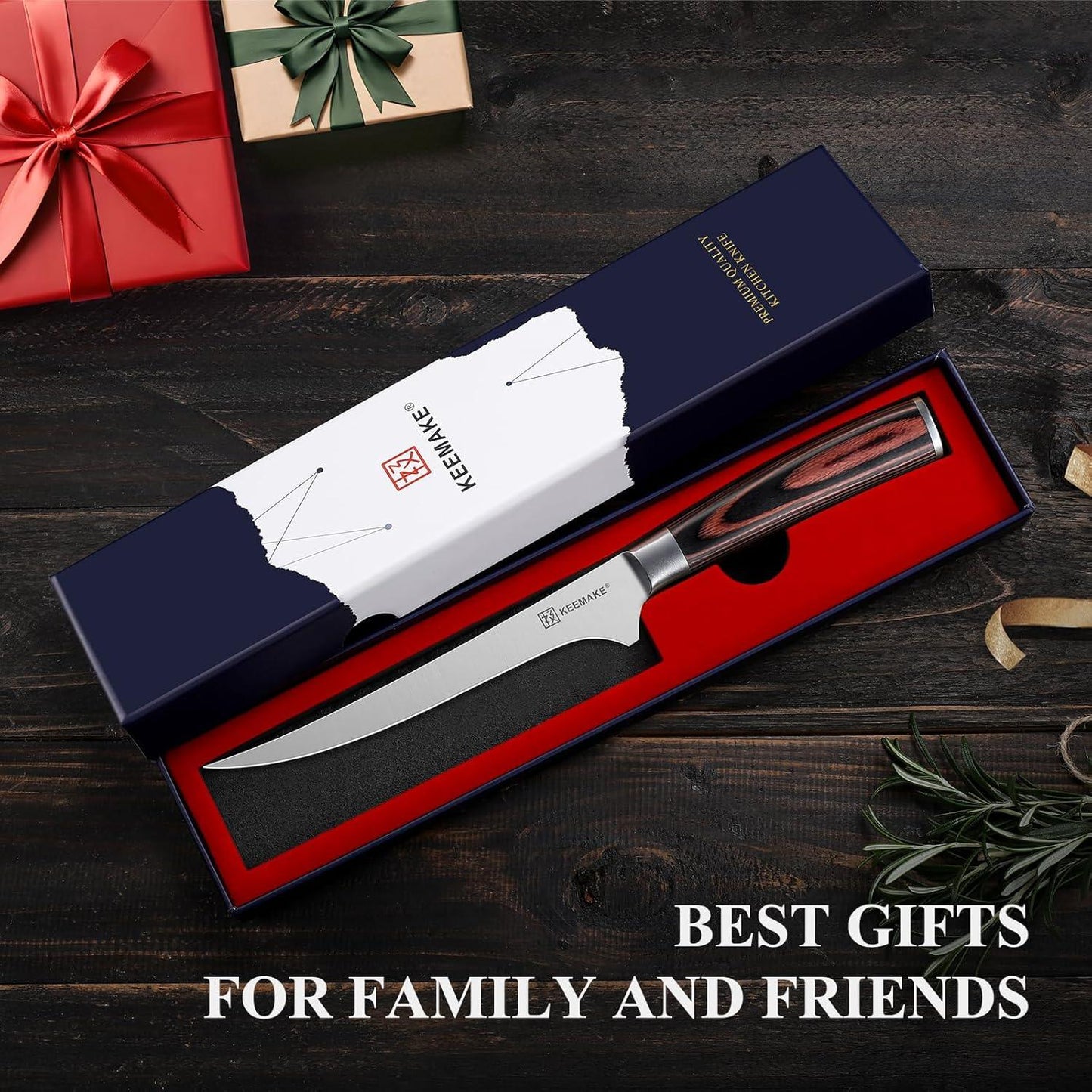 6-inch KEEMAKE boning knife with wooden handle in gift box on dark wood background with wrapped presents