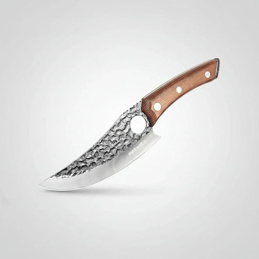 Japanese steel chef knife with rustic hammered blade and wooden handle on white background