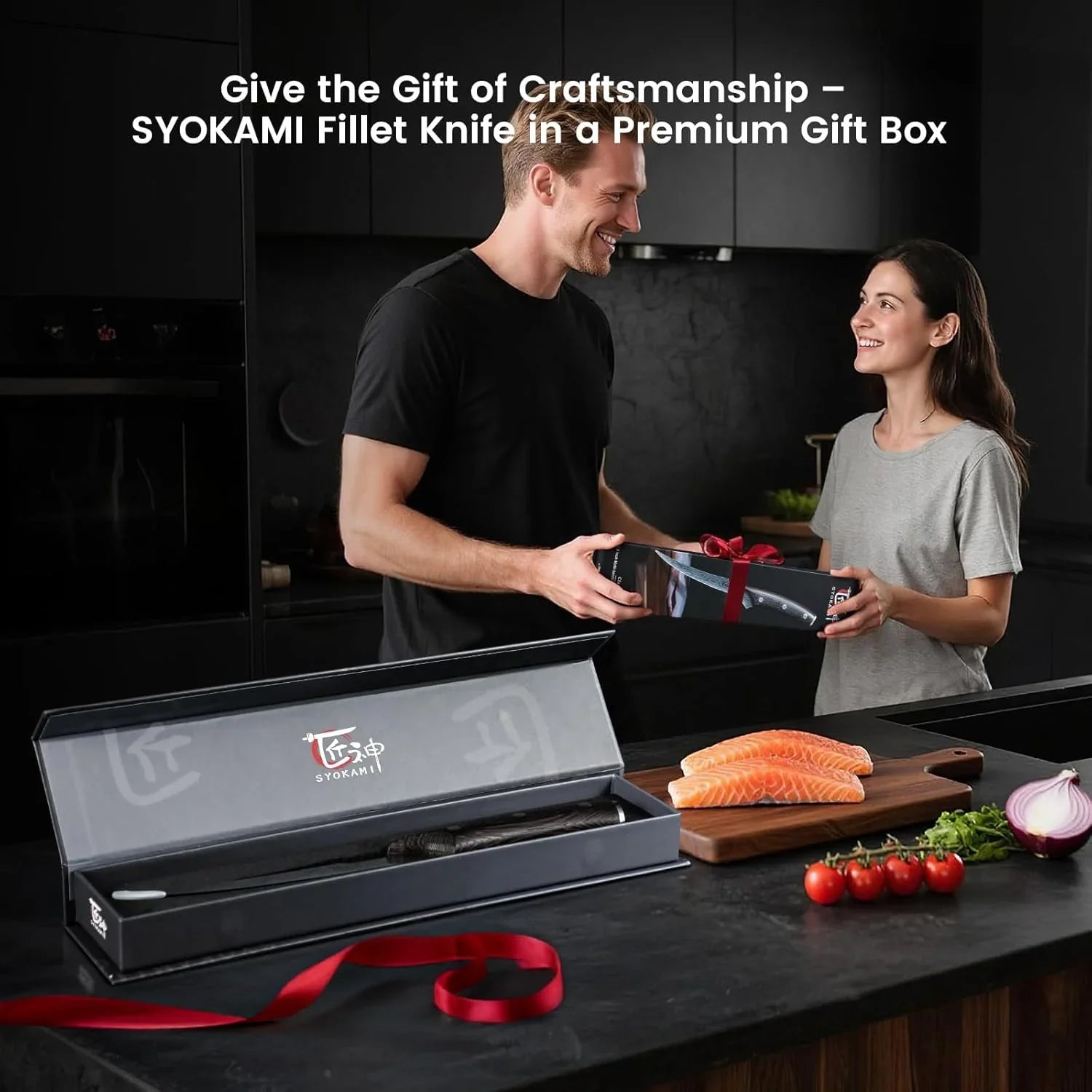 Man gifting woman a Syokami fillet knife in premium box in modern kitchen with salmon and vegetables