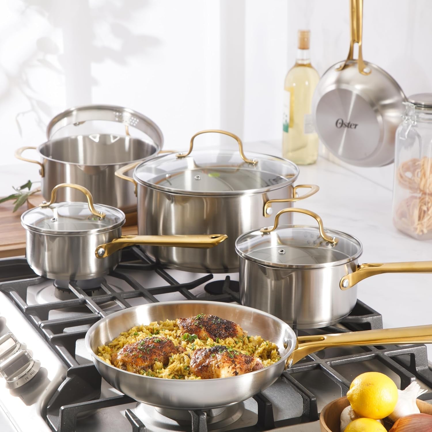 oster-platinum-sunstreak-pots-and-pans-set-10-piece-stainless-steel-cookware-set-with-glass-strainer-lids-and-gold-handles-induction-cookware-set