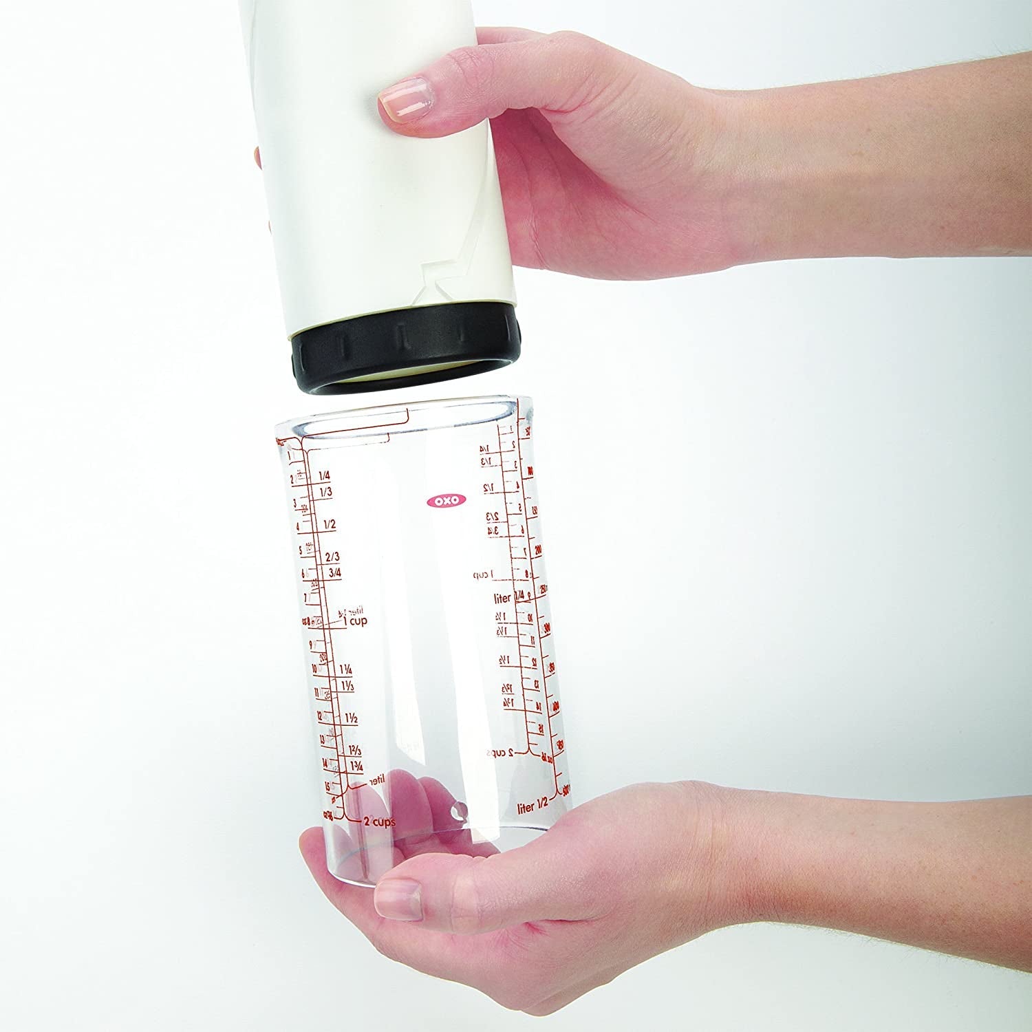 oxo-good-grips-adjustable-liquid-measuring-cup-2-cup-capacity-useful-for-measuring-dispensing-peanut-butter-honey-and-other-liquids-measurement-markings-dishwasher-safe