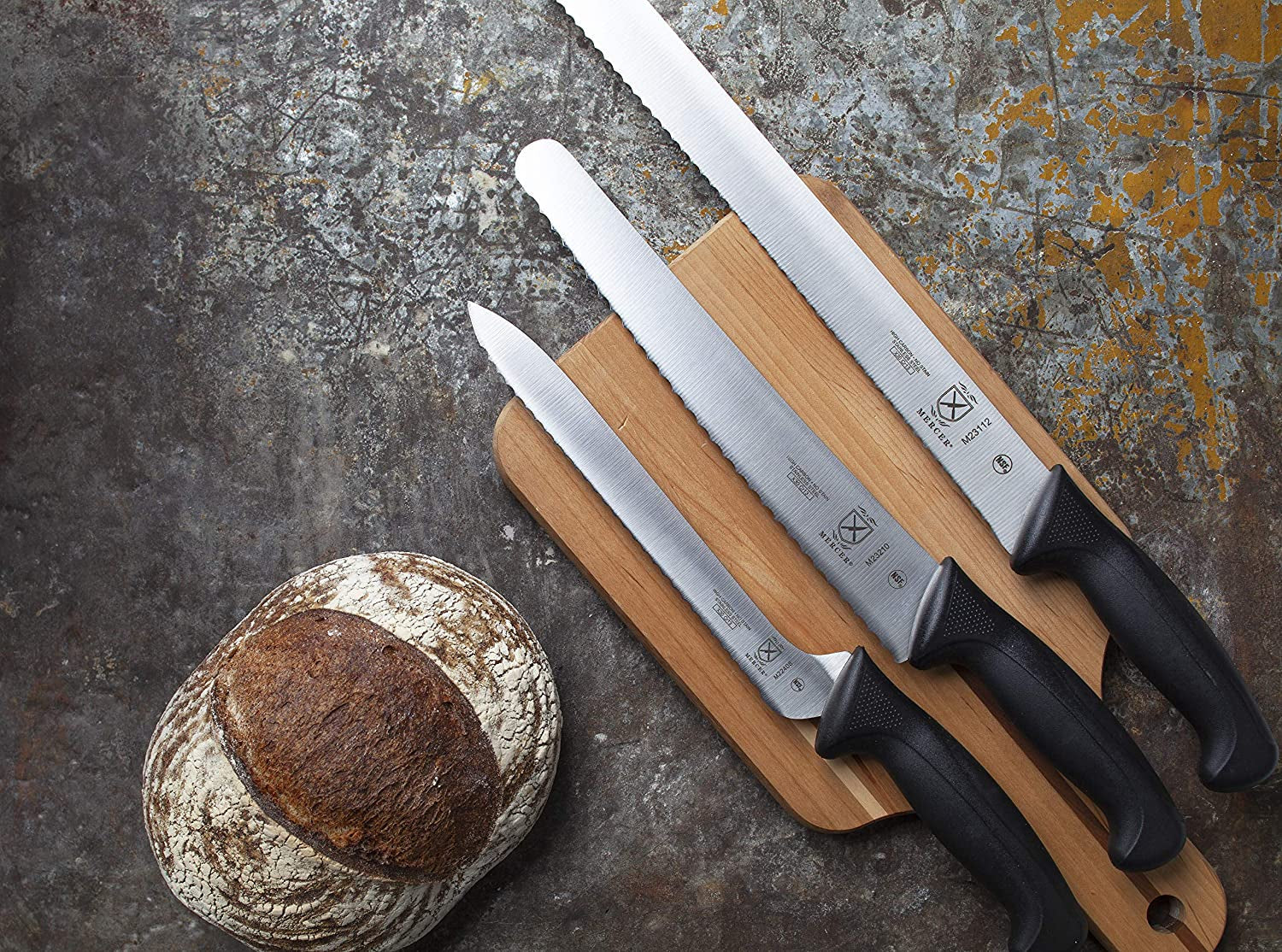 m23210-millennia-black-handle-10-inch-wide-wavy-edge-bread-knife