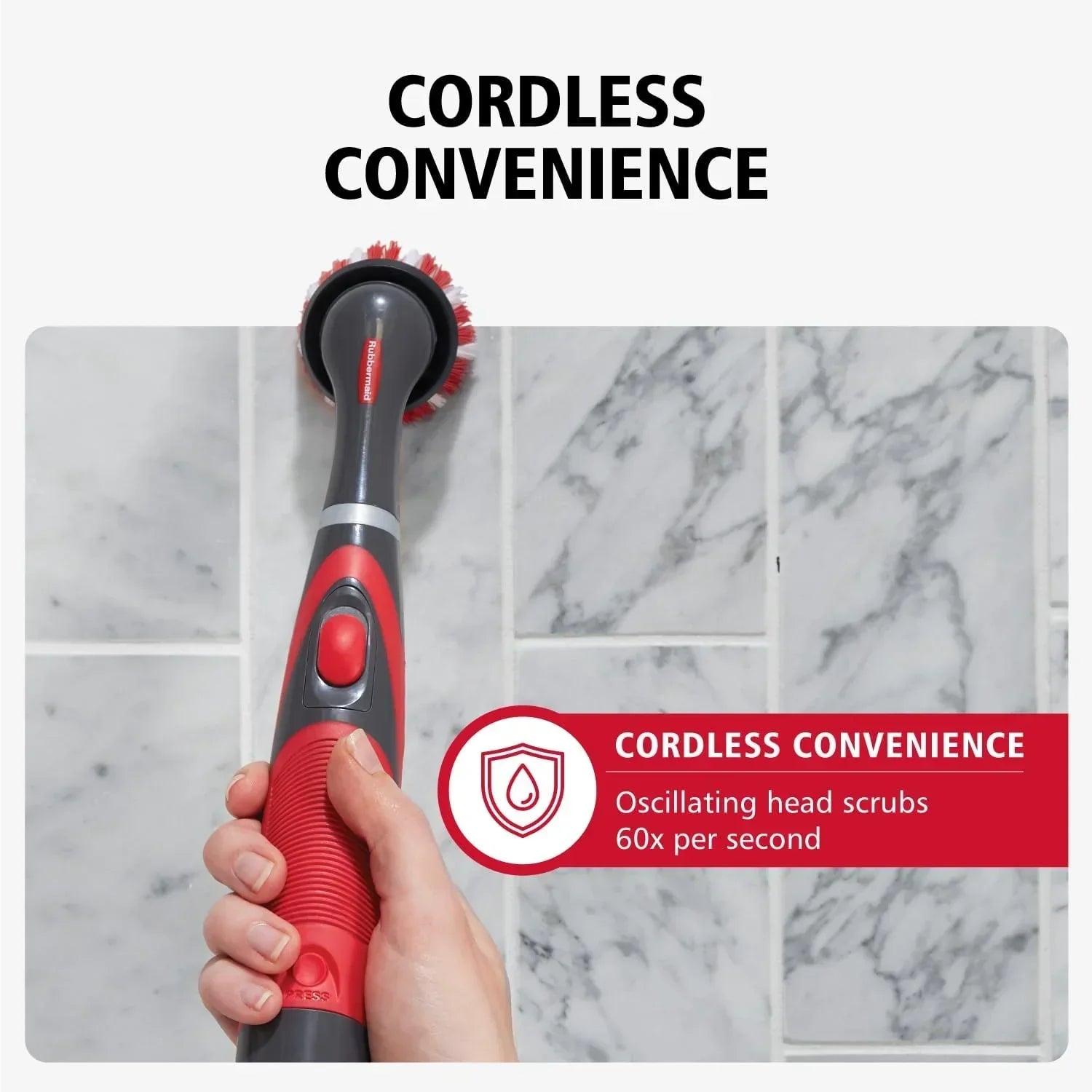 Red and gray cordless electric scrubber held by hand cleaning marble tile background