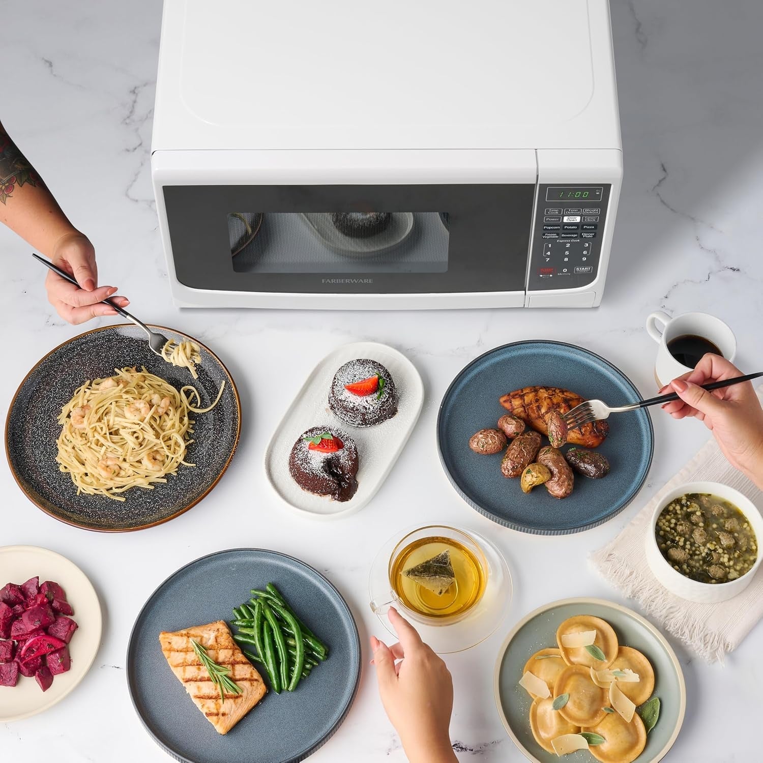 0-7-cu-ft-countertop-microwave-oven-700-watts-power-auto-cook-settings-defrost-easy-clean-and-child-safety-lock-white