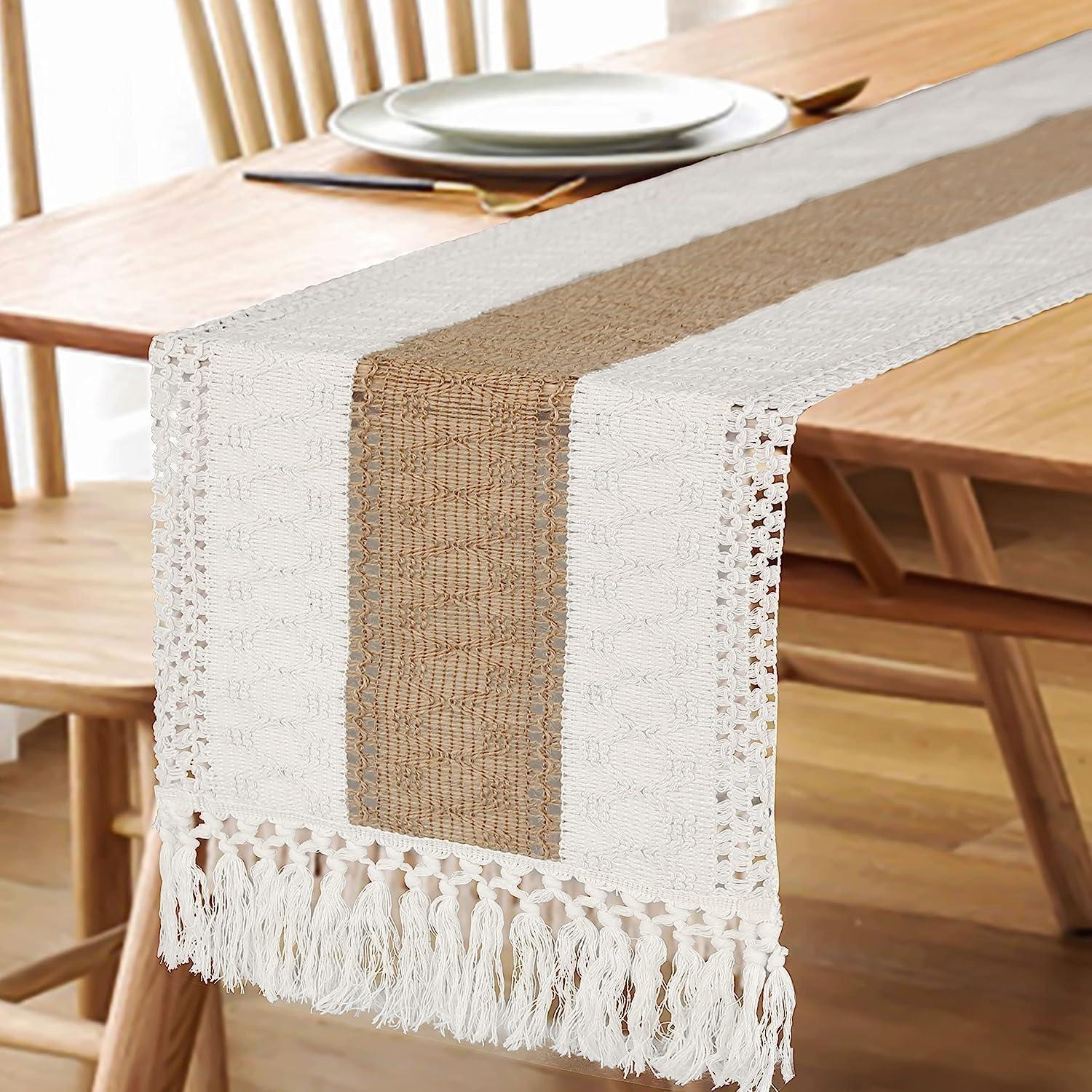 Rustic farmhouse wooden dining table with white and beige boho macrame table runner featuring tassels