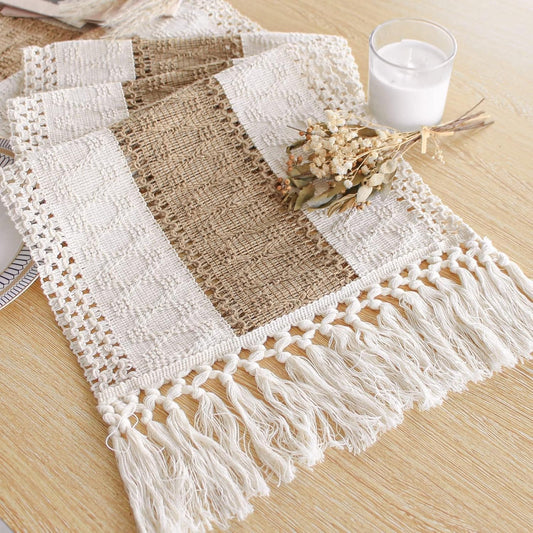 Boho macrame-style table runner with tassels 12x72 inches on a wooden dining table.