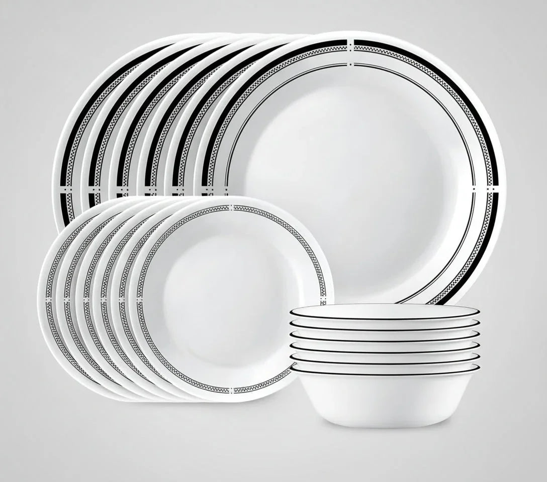 18-piece white round dinnerware set with black geometric border pattern, including plates and bowls