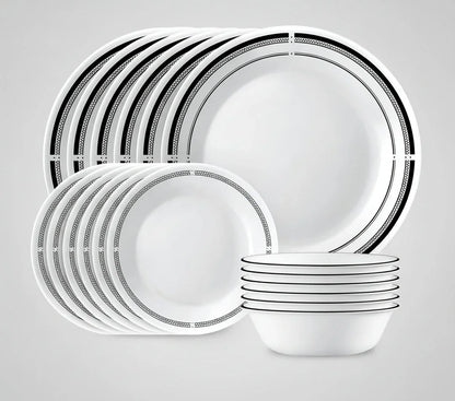 18-piece white round dinnerware set with black geometric border pattern, including plates and bowls