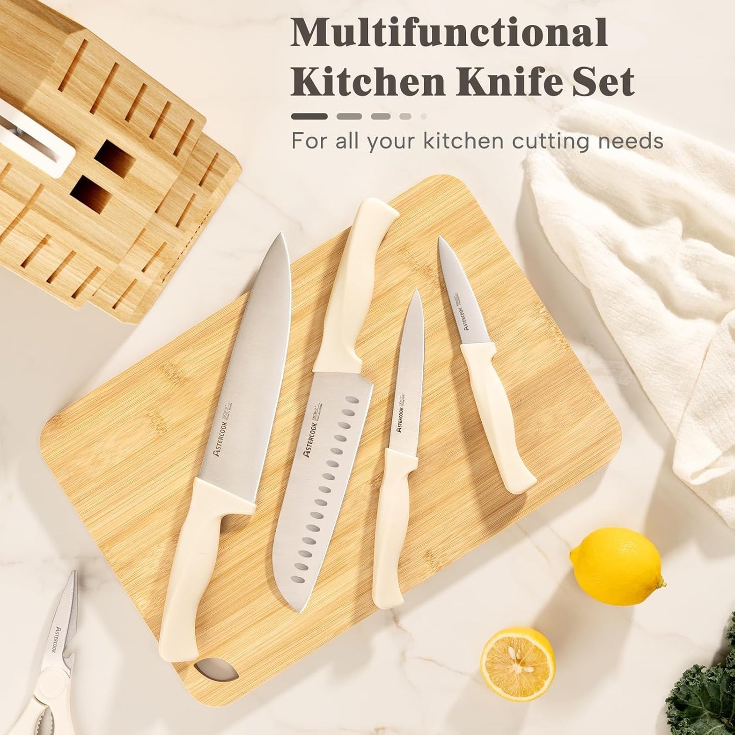 Chef knife, santoku knife and serrated bread knife laid out on a cutting board.