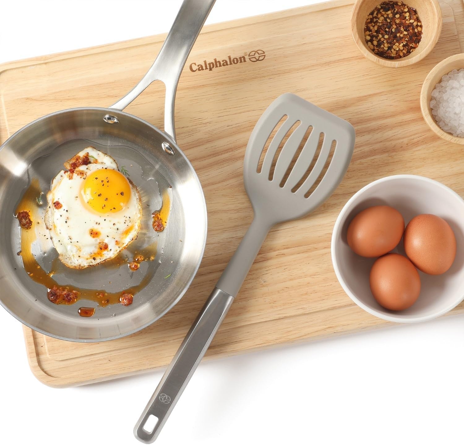 calphalon-prime-slotted-turner-kitchen-flipping-spatula-slotted-spatula-with-silicone-head-and-stainless-steel-handle-heat-resistant-nonstick-cookware-for-flipping-and-draining-taupe