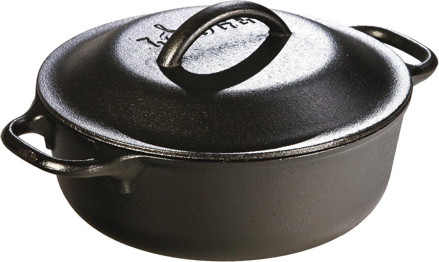 Cast iron Dutch oven with lid slightly open and steam escaping from inside.