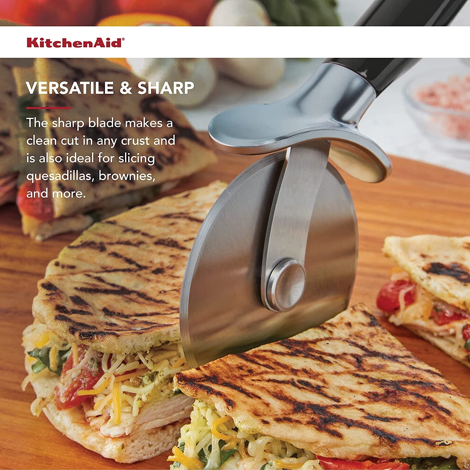 kitchenaid-classic-pizza-wheel-with-sharp-blade-for-cutting-through-crusts-pies-and-more-built-in-finger-guard-for-safety-and-comfort-grip-to-protect-fingers-dishwasher-safe-9-inch-black