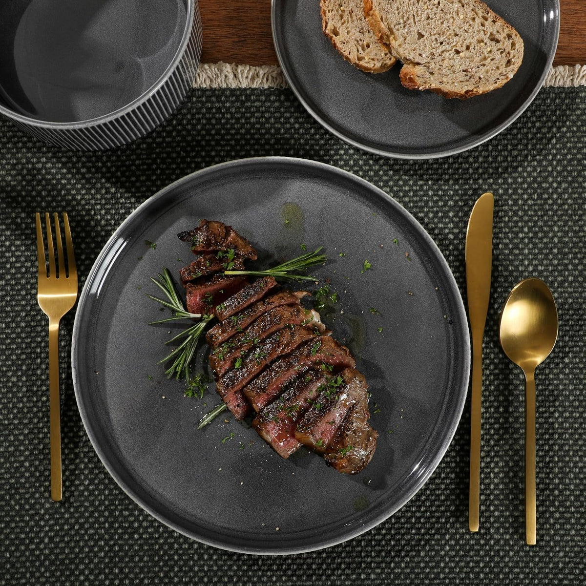 solana-coast-12-piece-stoneware-reactive-glaze-service-for-4-ceramic-plates-and-bowls-modern-shape-embossed-dinnerware-set-black