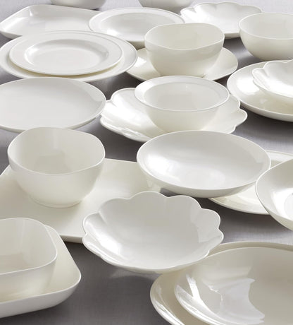 Studio 1414 Scallop Bone China 16-Piece Dinnerware Set for 46
