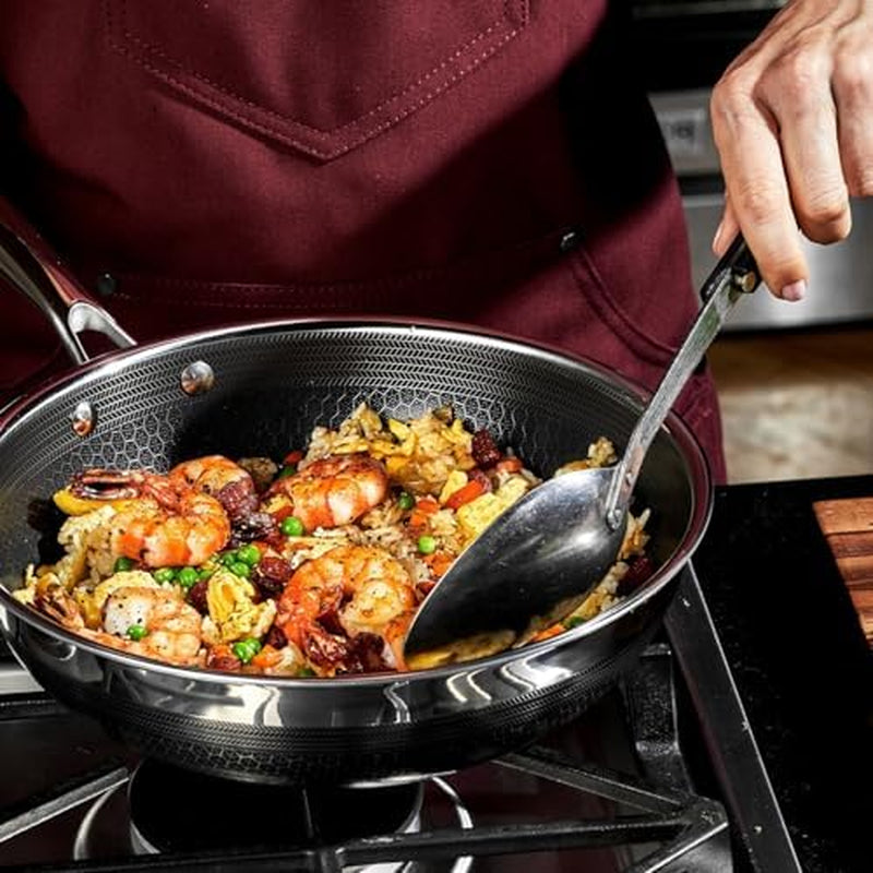 hexclad-hybrid-nonstick-7-piece-cookware-set-8-10-and-12-pans-with-lids-and-10-wok-stay-cool-handles-dishwasher-and-oven-safe-induction-ready-compatible-with-all-cooktops