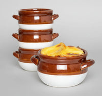 Set of four 16 oz ceramic French onion soup crocks with brown and white glaze, one filled with baked cheesy soup
