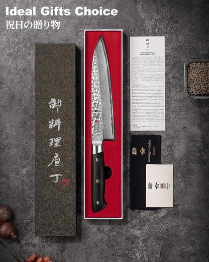 Japanese chef knife with 67-layer Damascus blade in red-lined box, displayed with packaging and documents
