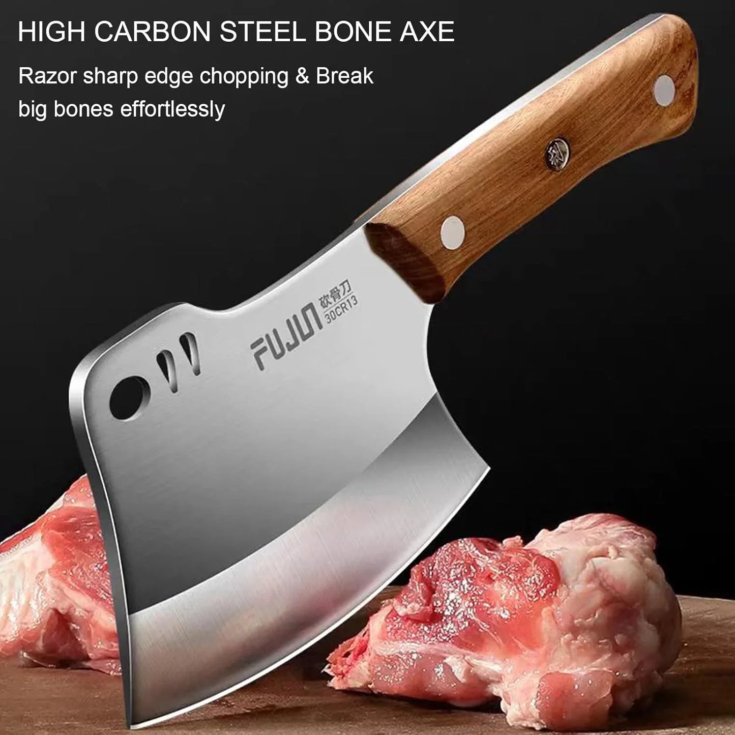 High carbon steel butcher cleaver with wooden handle chopping raw meat on wooden board